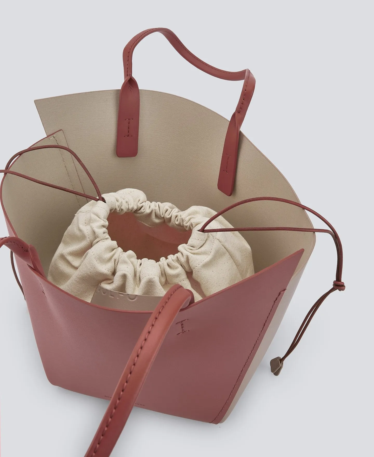Asymmetric leather shopper bag woman