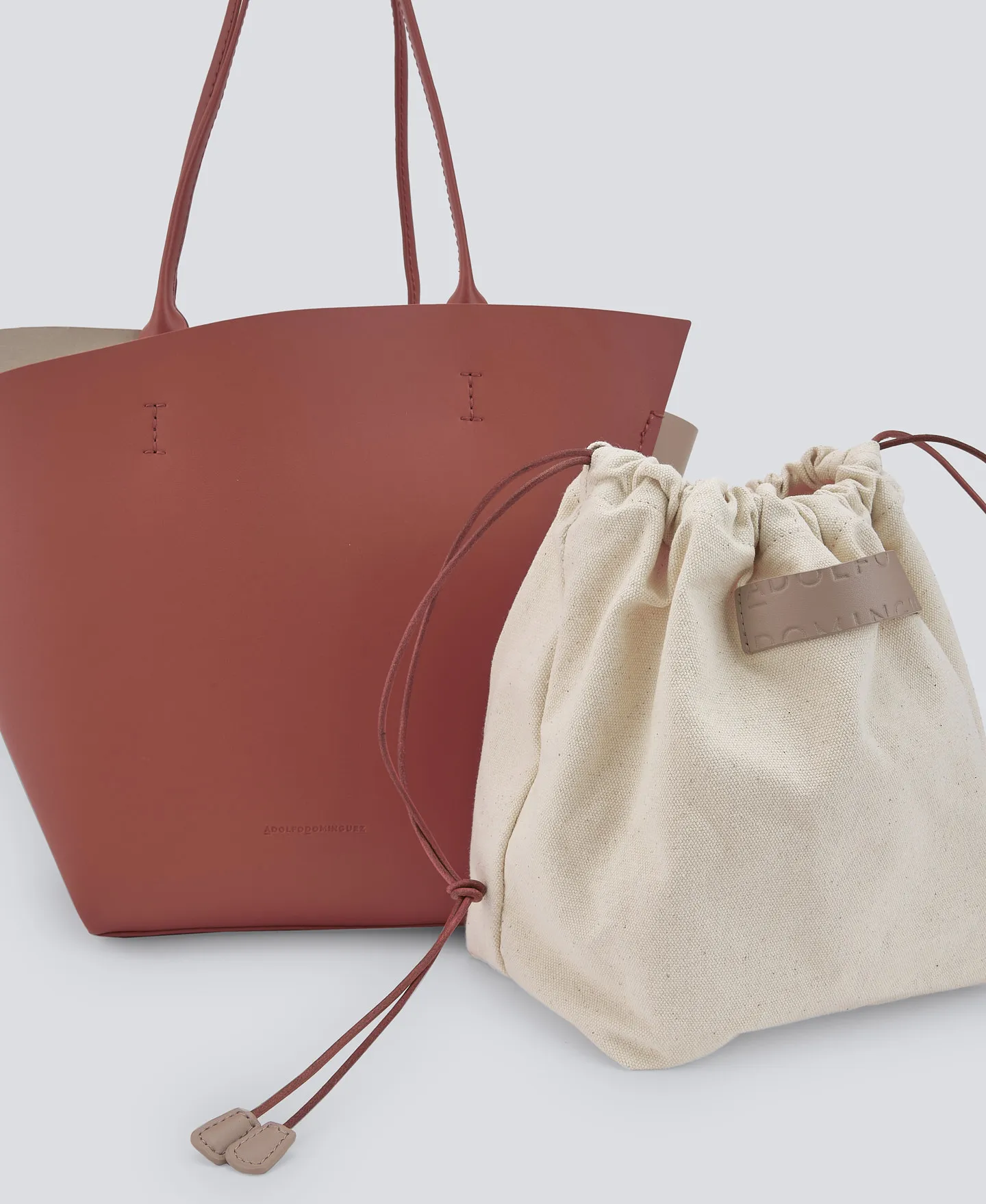 Asymmetric leather shopper bag woman