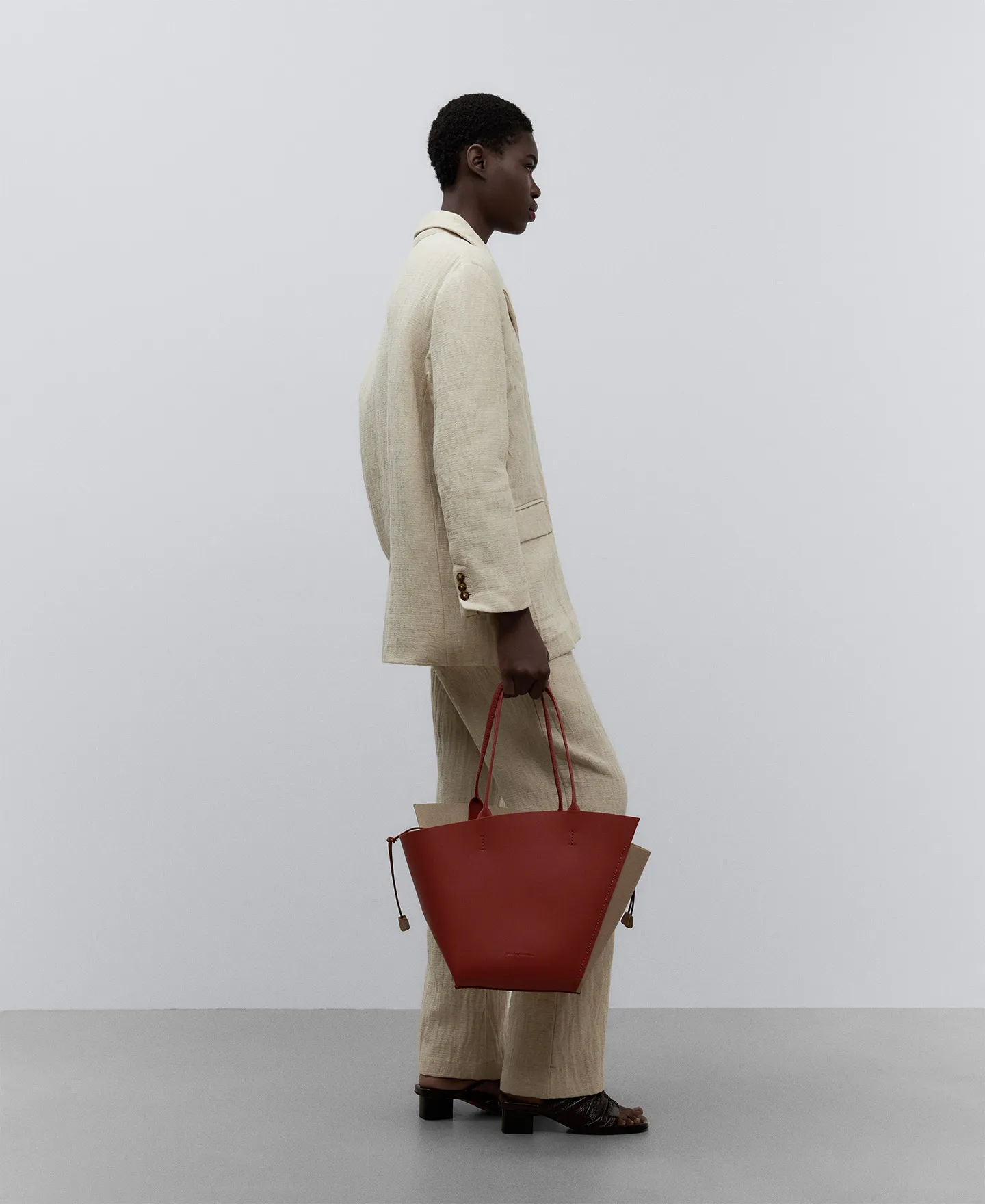 Asymmetric leather shopper bag woman