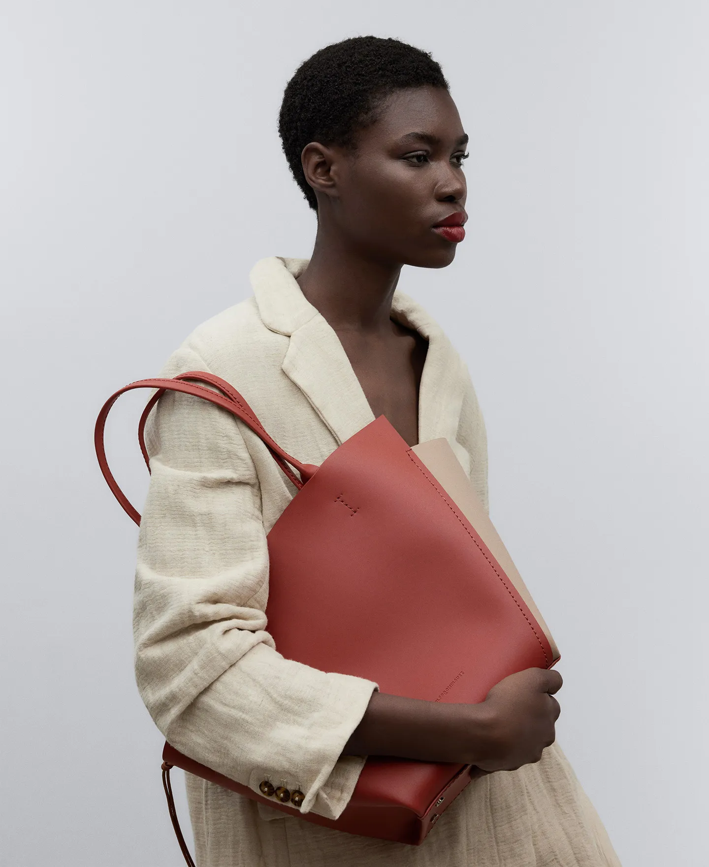 Asymmetric leather shopper bag woman