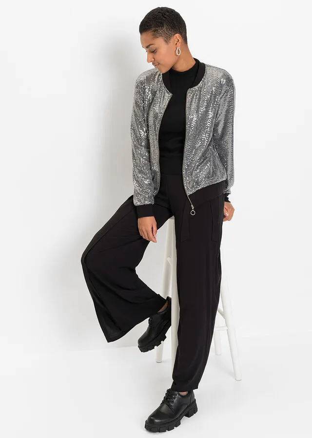 BLUSóN CON LENTEJUELAS NEGROPLATA ESTAMPADO