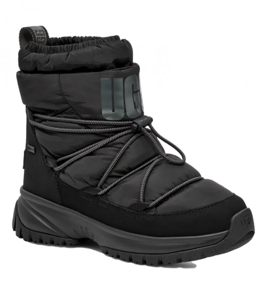 Botas W Yose Puffer Mid negro