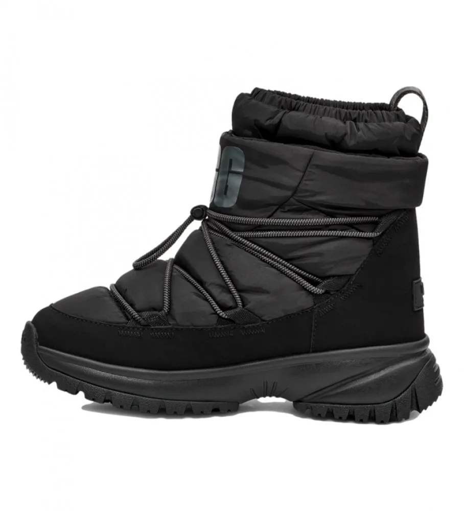 Botas W Yose Puffer Mid negro