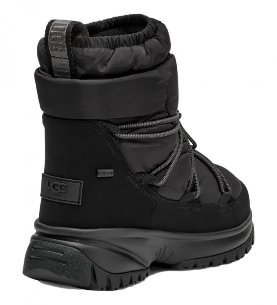 Botas W Yose Puffer Mid negro
