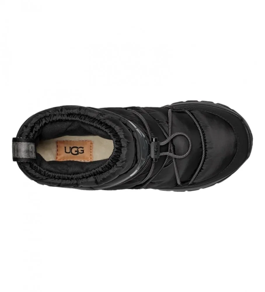 Botas W Yose Puffer Mid negro