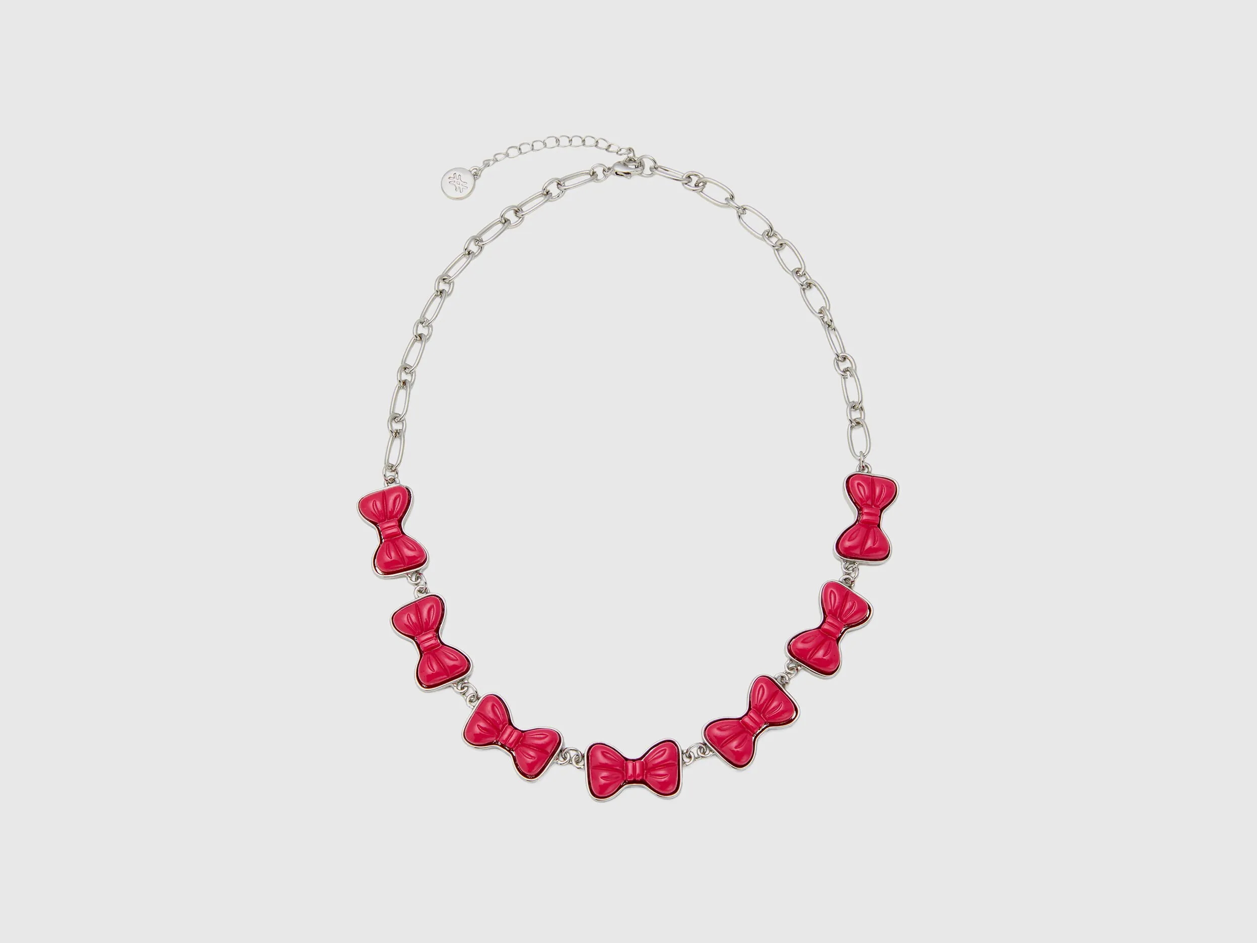 Collar con lazos fucsias