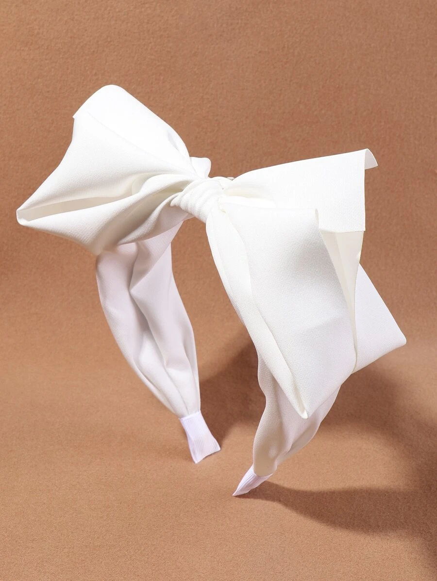 Diadema ancha con lazo blanco