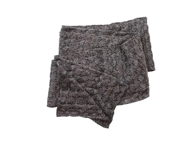 DOLCE & GABBANA, Bufanda gris abierta de punto con lúrex. 