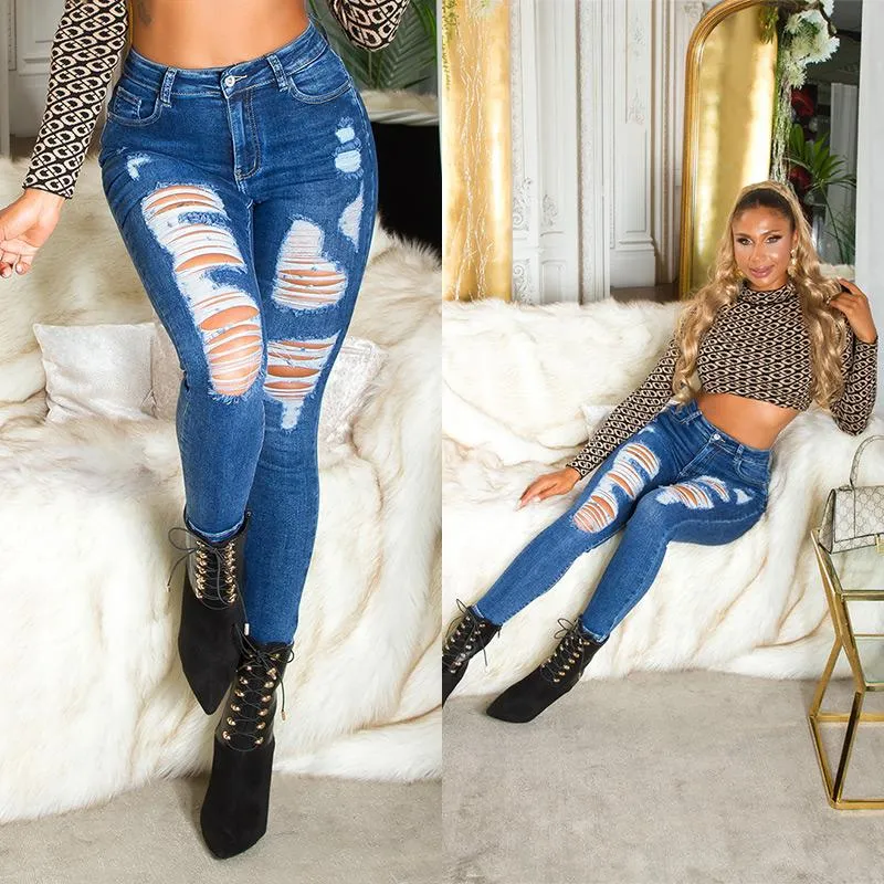 Jeans skinny desgastados azul oscuro