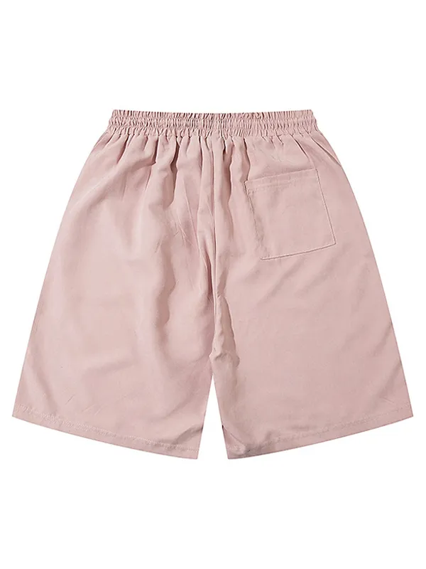 Pantalones cortos sueltos con estampado callejero