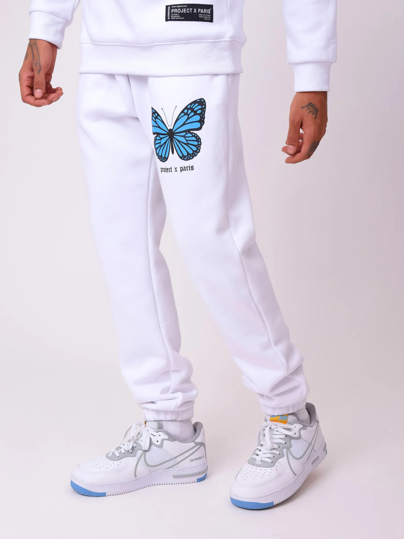 Pantalón de chándal con estampado de mariposas