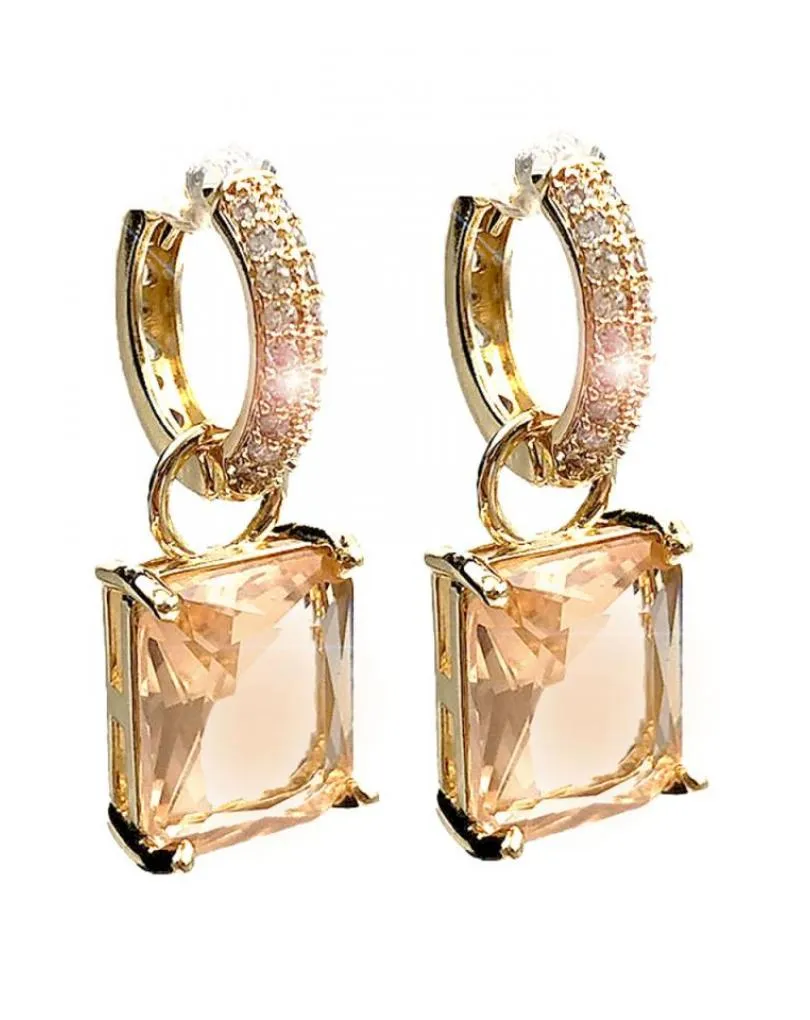 PENDIENTES LARGOS DORADOS CON ARO ELEGANTE CON CIRCONITAS