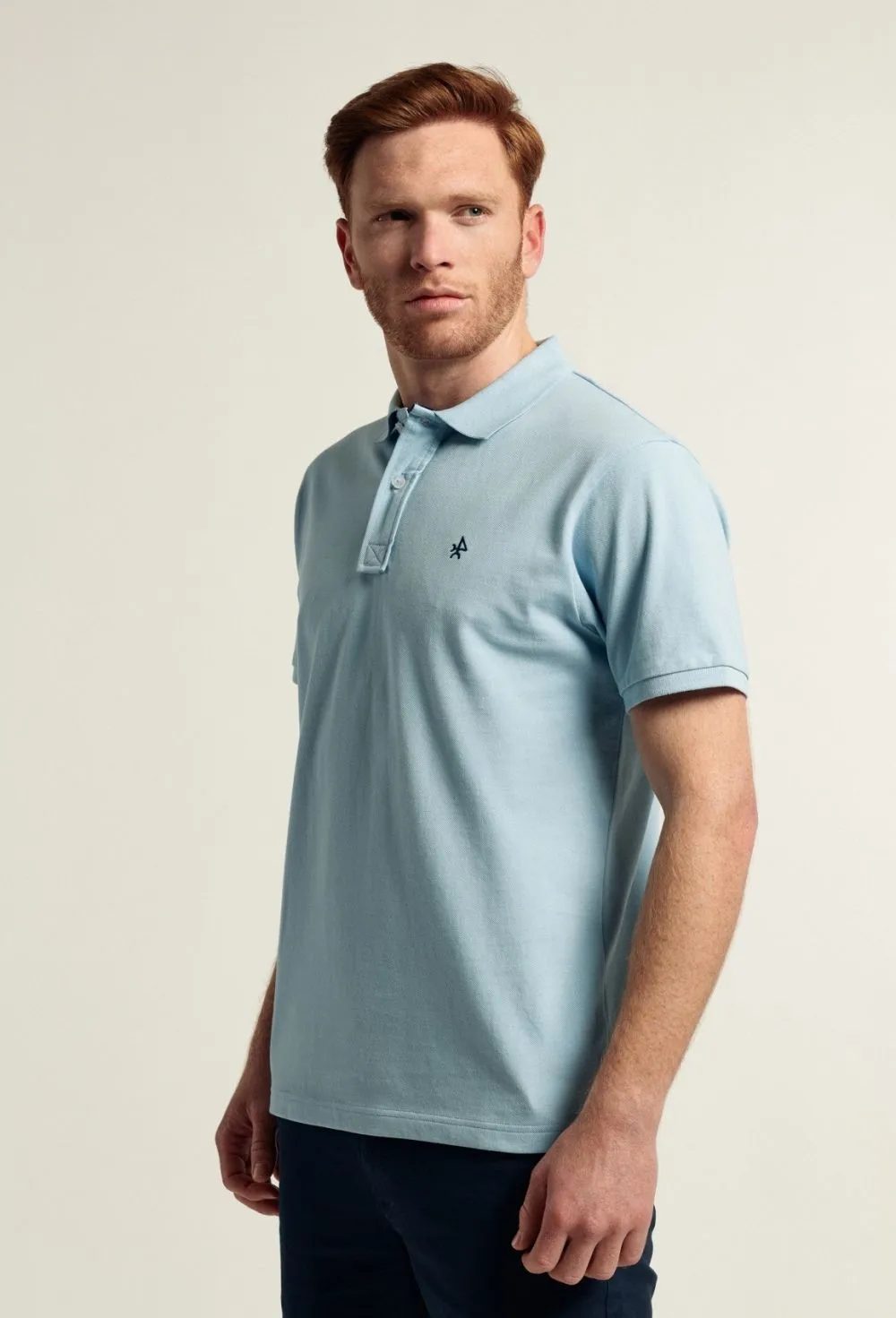 Polo clásico color celeste