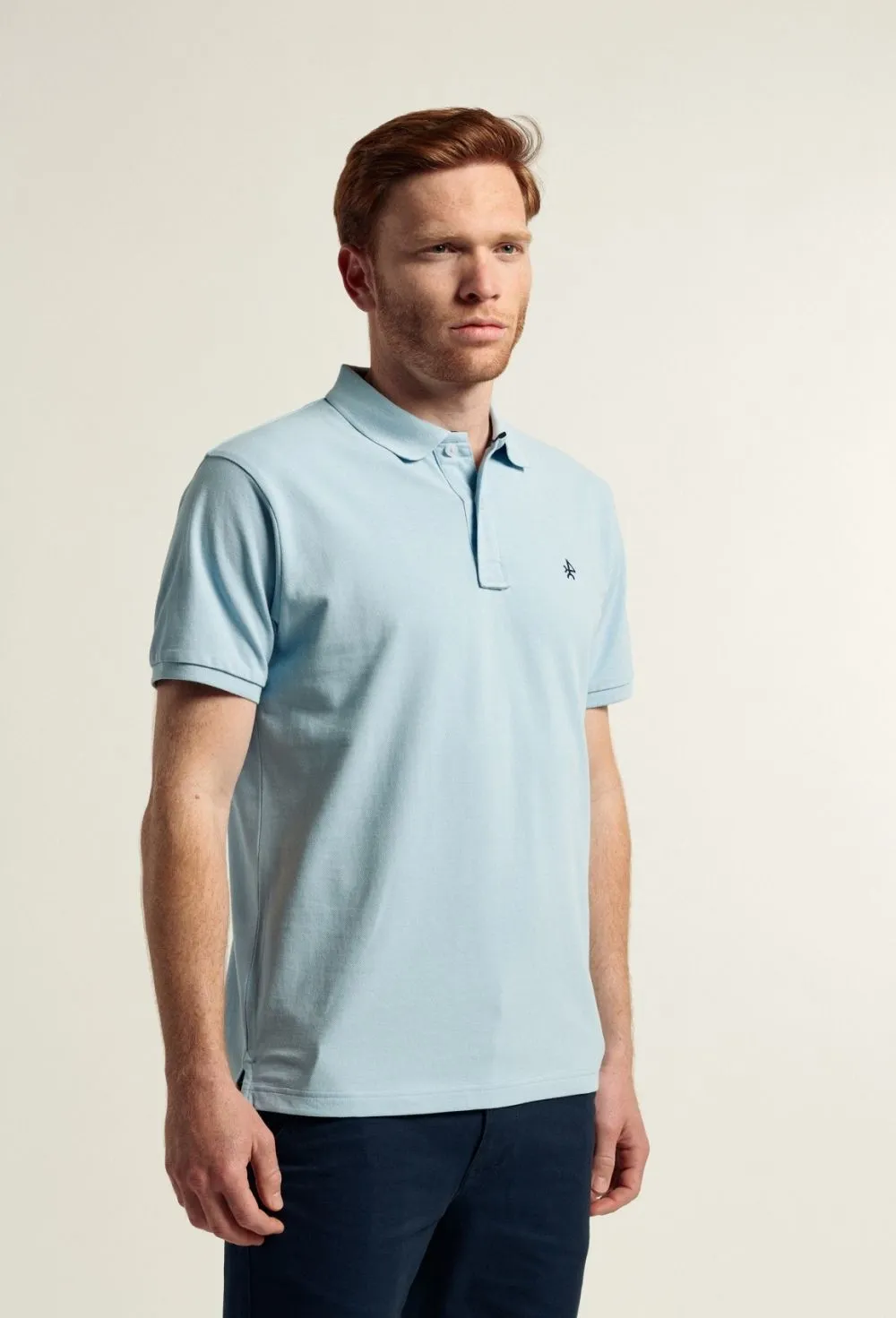 Polo clásico color celeste