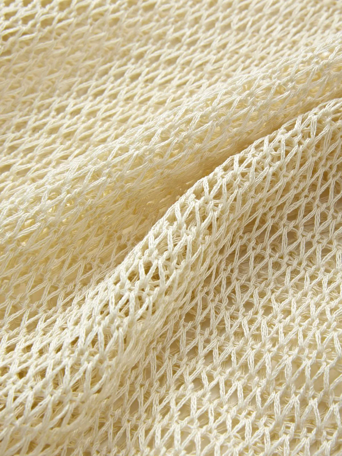 Top de punto de crochet de manga larga de gran tamaño