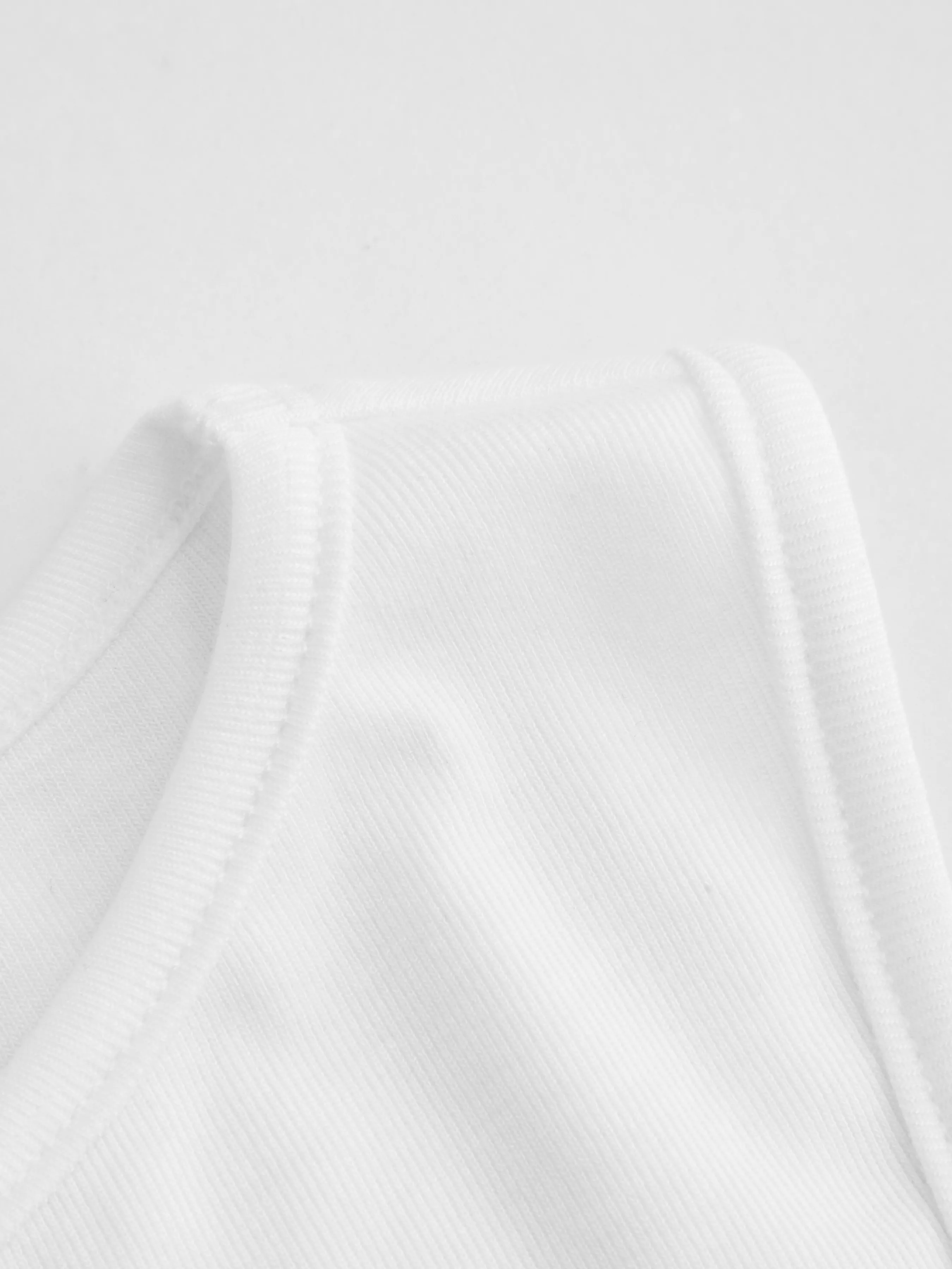 Top de tirantes con cuello redondo y lazo