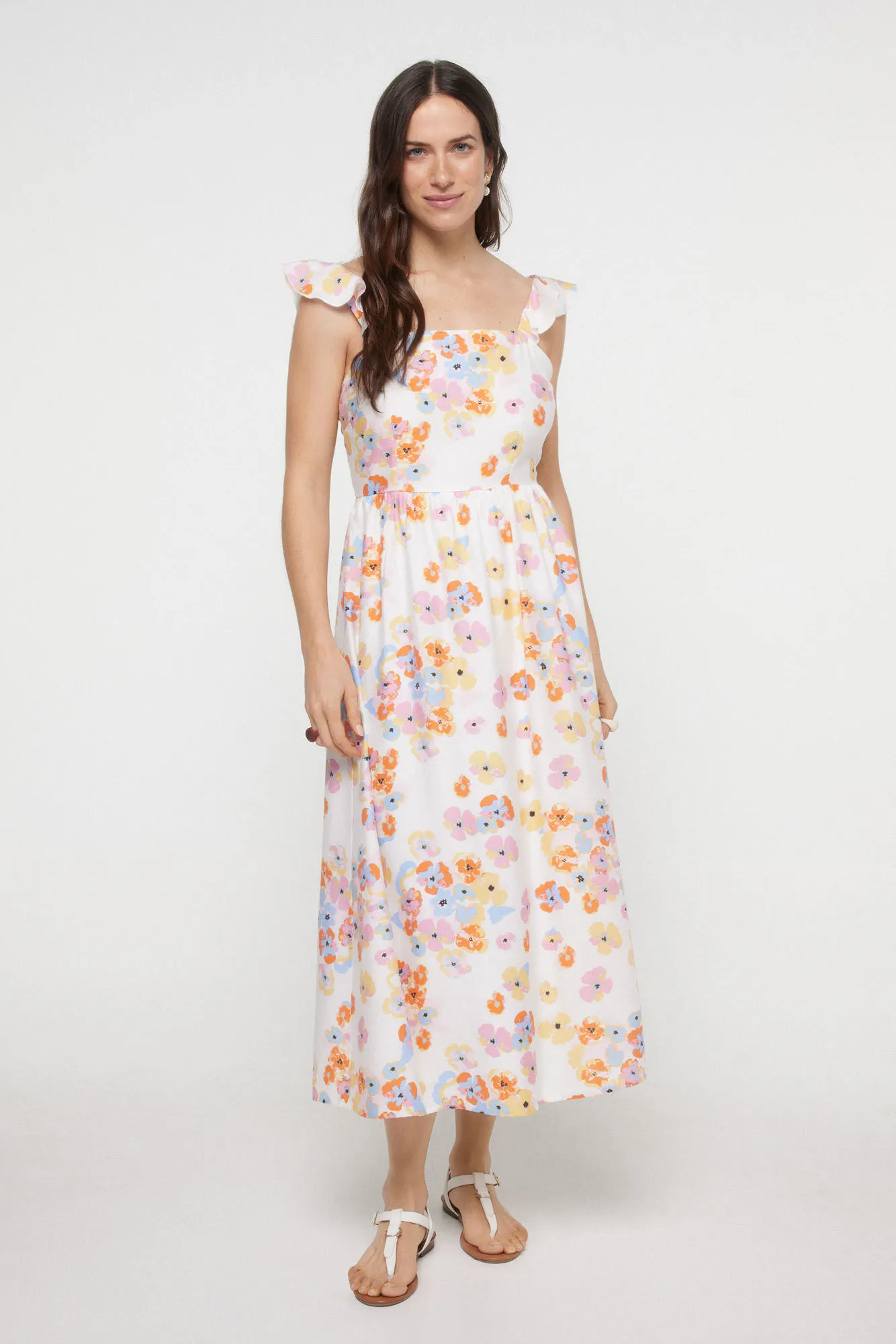 Vestido midi de tirante con volante y estampado floral.